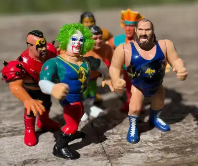 These are vintage 1990s WWF Hasbro wrestling action figures, specifically featuring Doink the Clown and Nasty Boy Knobbs